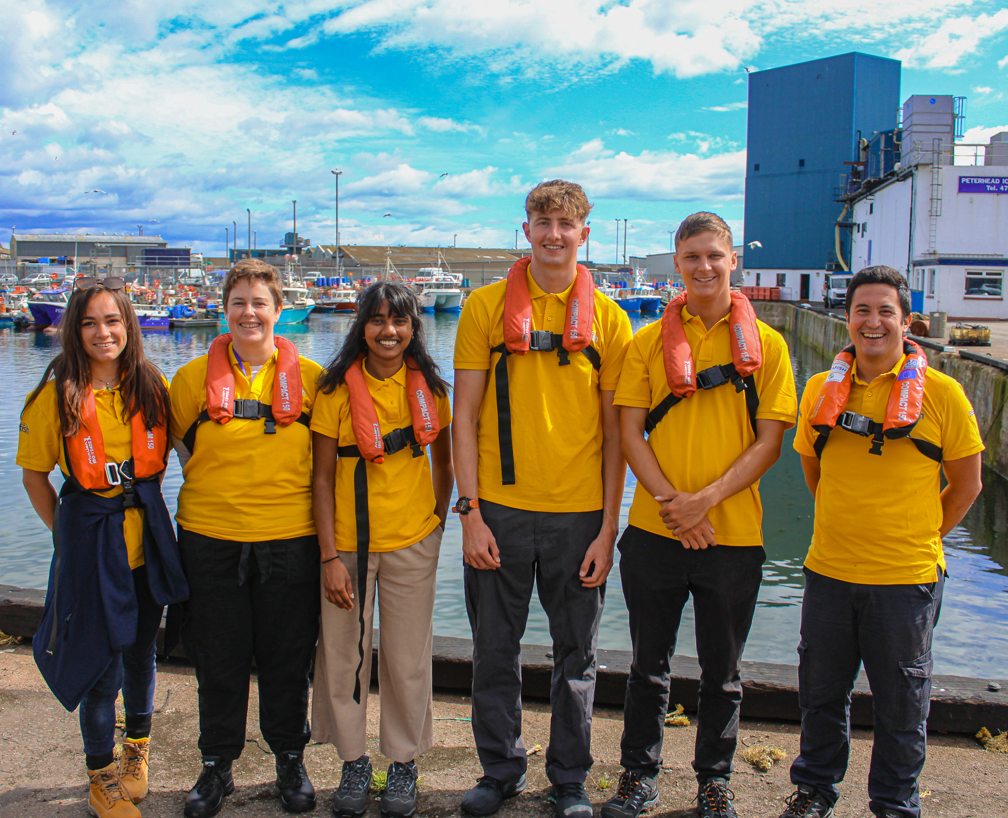 Group shot of fleet survey team at harbour