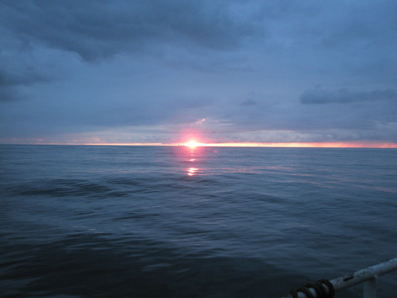 Photo of a sunset at sea