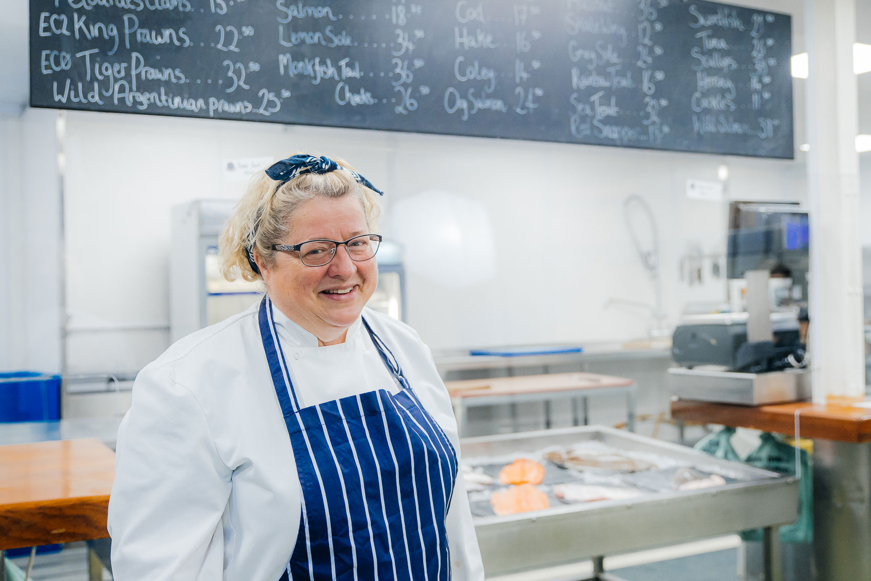 Photo of CJ Jackson in a fishmongers