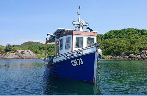 An image of the Lorna Shane vessel stationary in water.